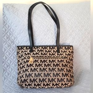 Michael Kors tan and black signature canvas tote bag